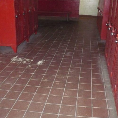Tile restoration - unsealed locker room before
