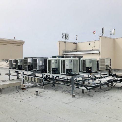 air-conditioning-units-on-roof-of-a-high-rise-cond-JL2CGGG